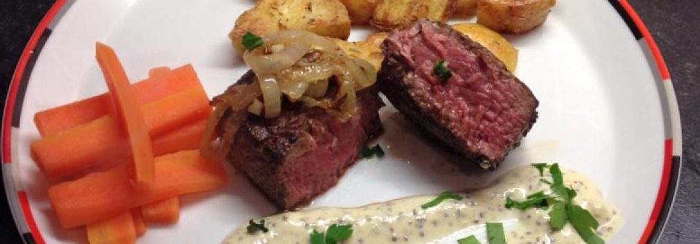 Seared fillet steak with caramelised Crudie Farm onions, Denhead carrots, and Ardler Rooster roasties.  Served with a cream and Scottish honey mustard sauce.